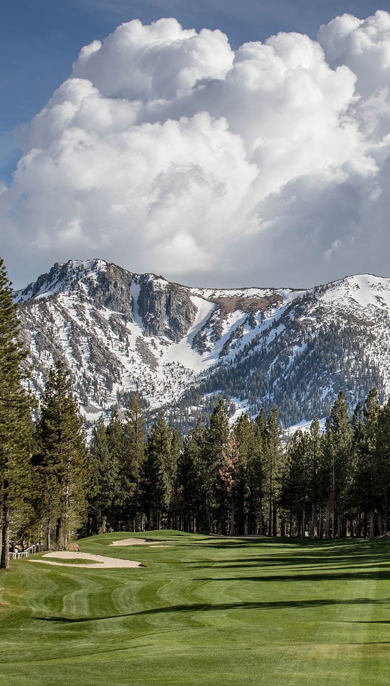 Sierra Star Golf Course fairway with snow covered Sherwin mountains in the background.
