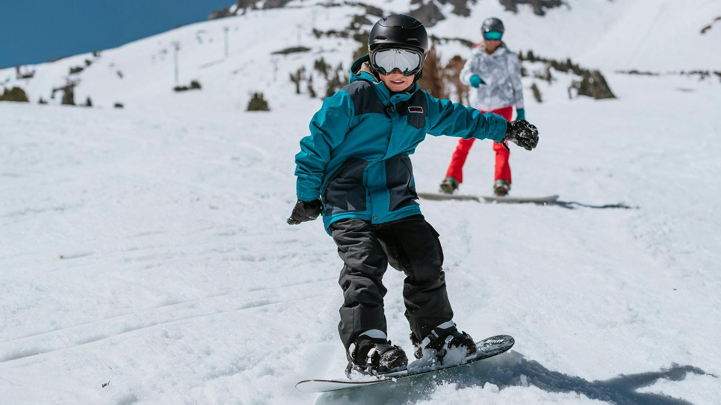 Child beginner snowboarder