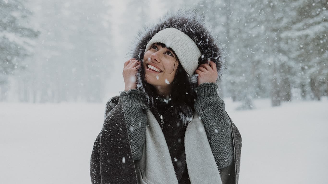 Woman enjoying new snow