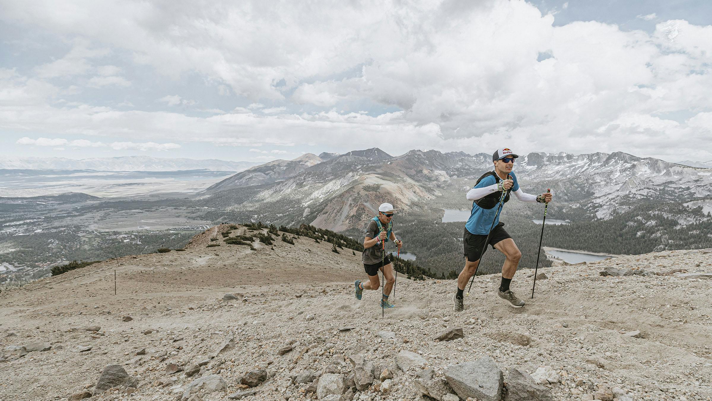 Two trail runners ascend the Dragon's Back of Mammoth Mountain