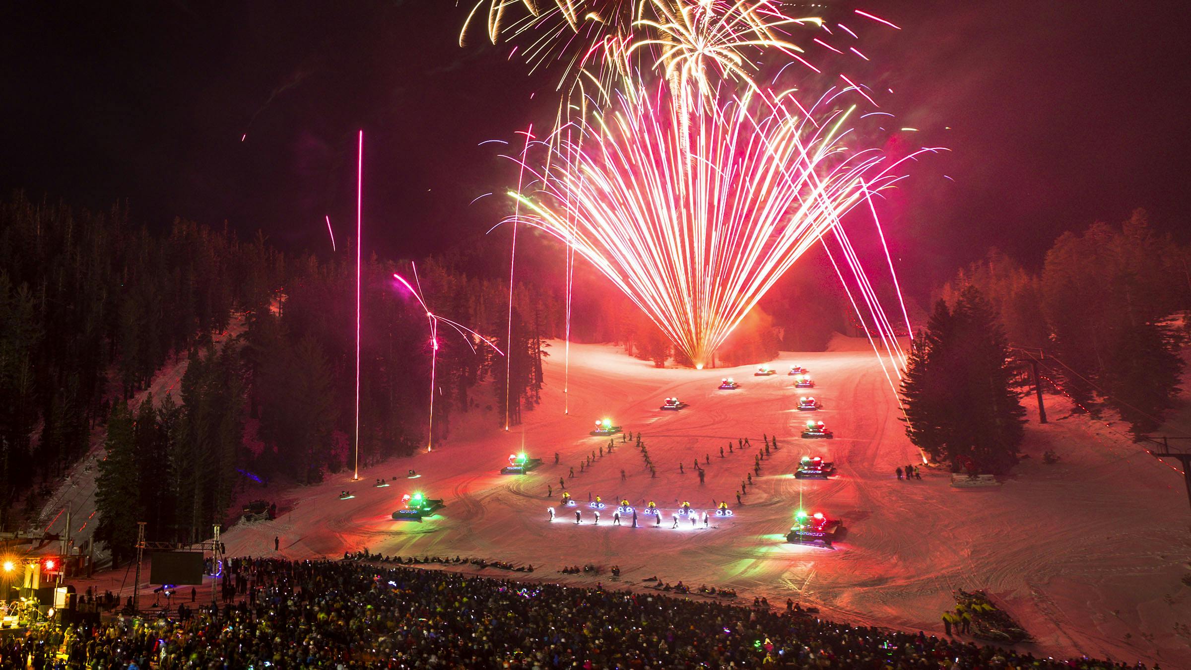 Fireworks and lights on ski slope at Night of Lights on Mammoth Mountain