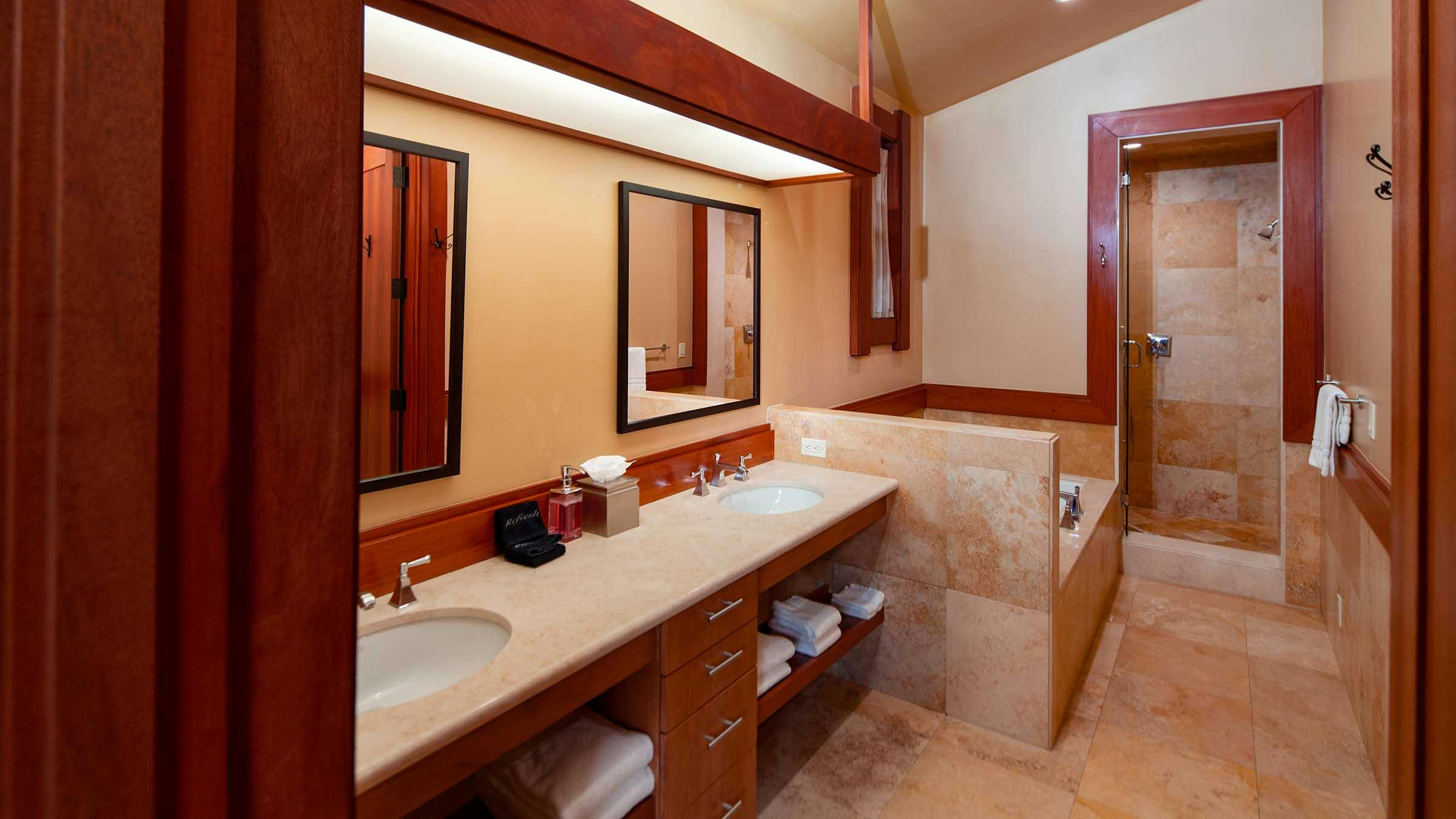 Bathroom with double vanity inside The Kestrel at Obsidian Residences