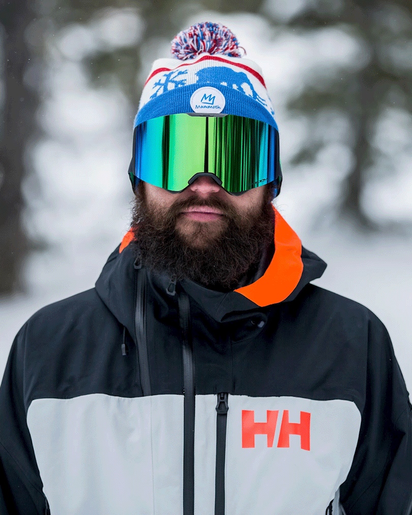 GIF of a skier wearing the beanies.