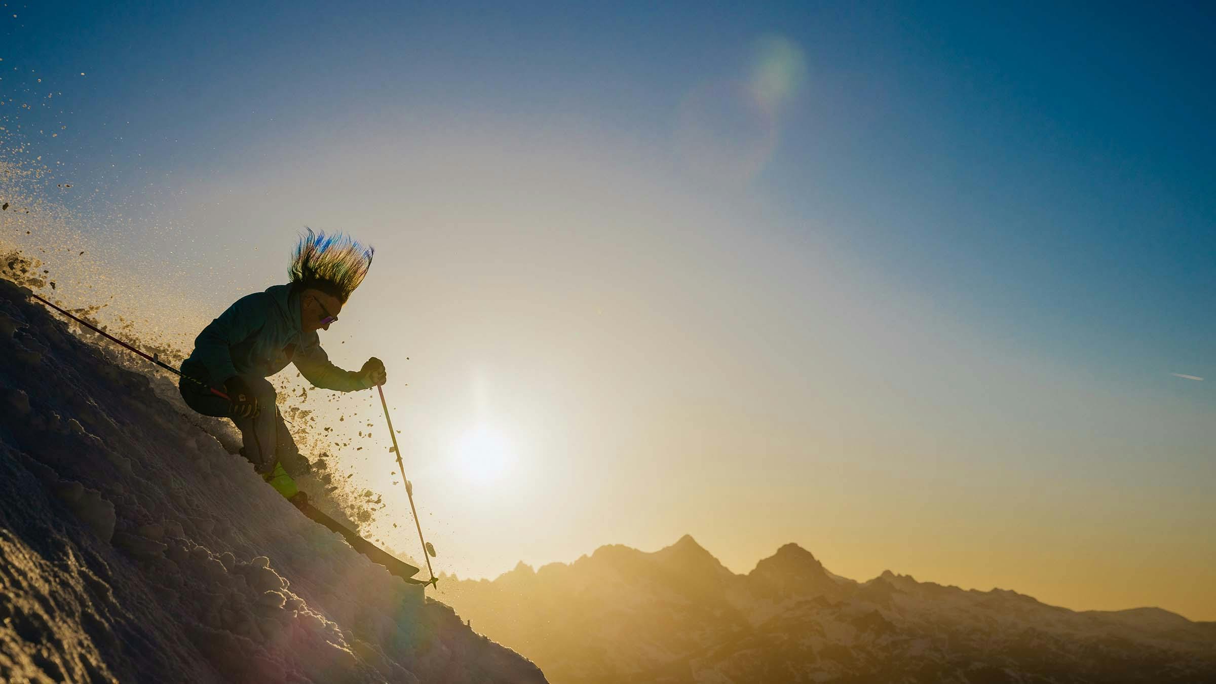Glen Plake skiing at sunset