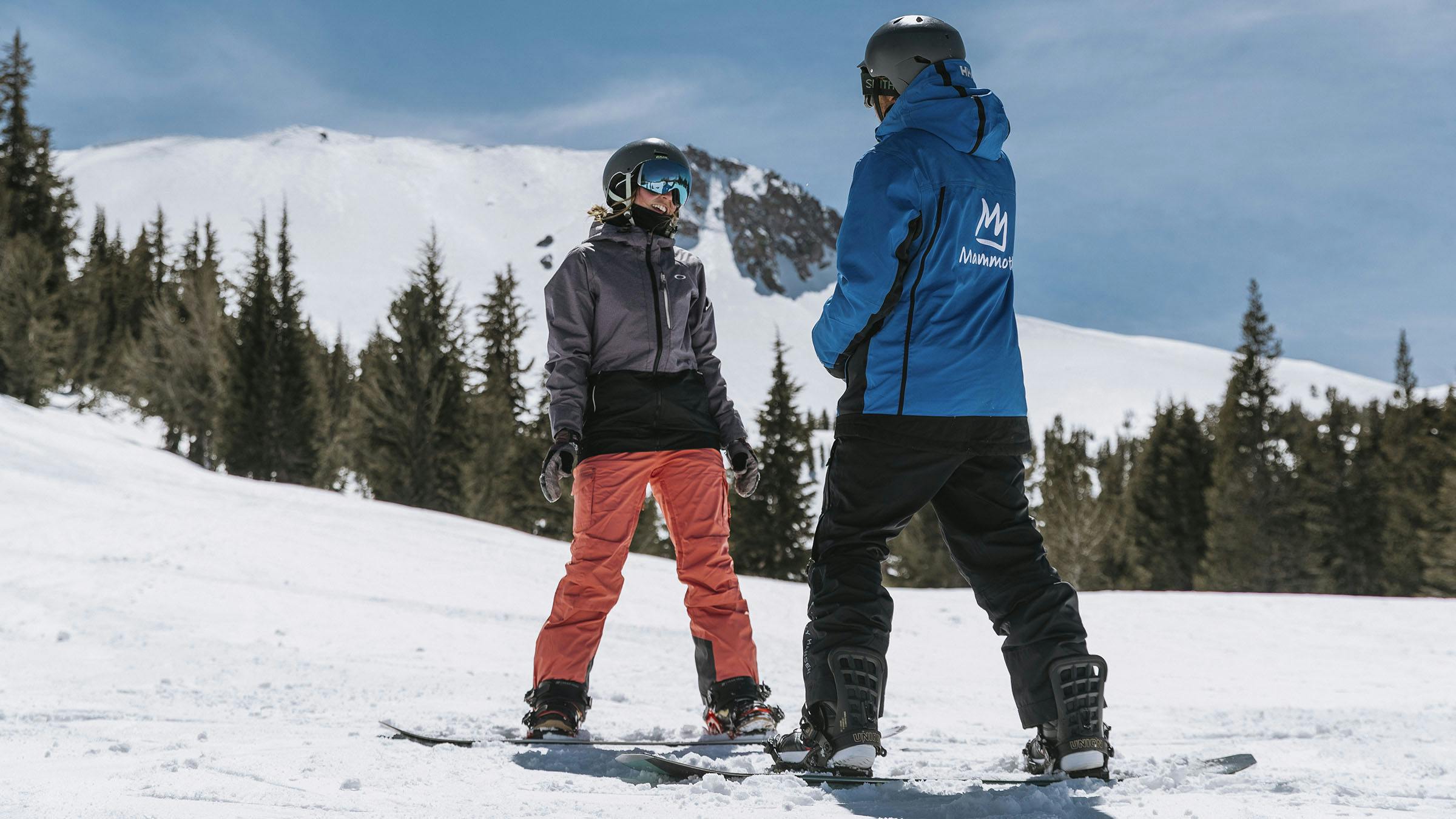 Snowboarder and instructor