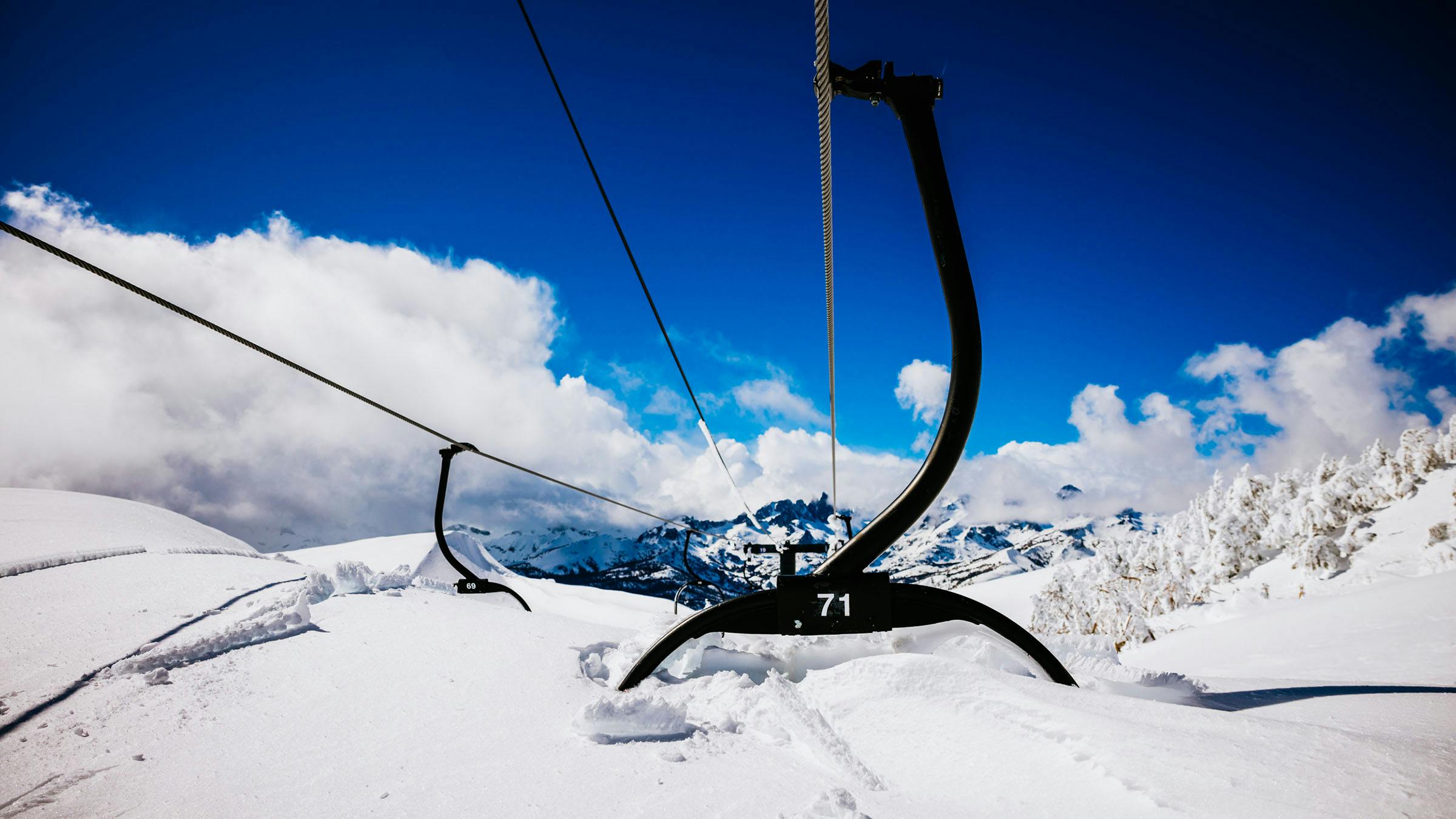 Ski lift buried under snow
