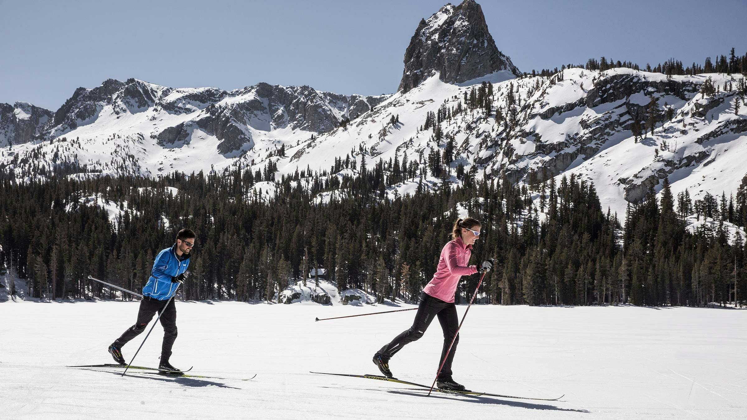 Couple cross-country skiing in the Lakes Basin